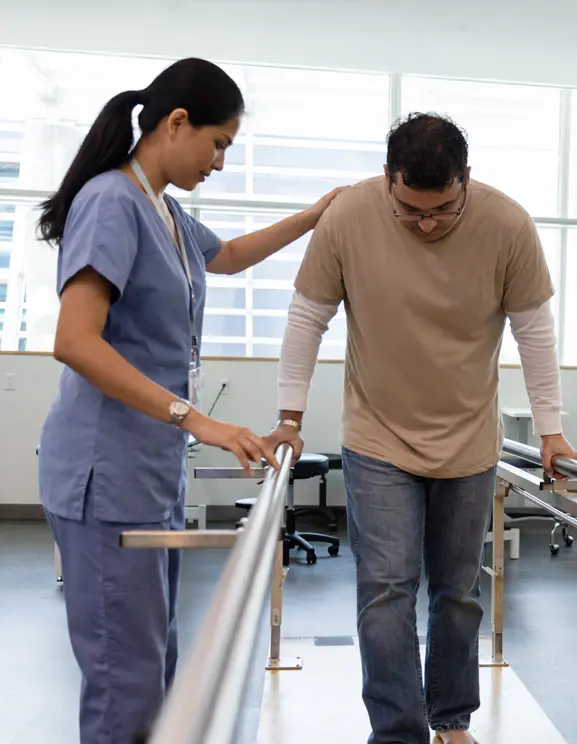 Physiotherapist conducting physical therapy session at Punarvaas rehabilitation centre Bangalore