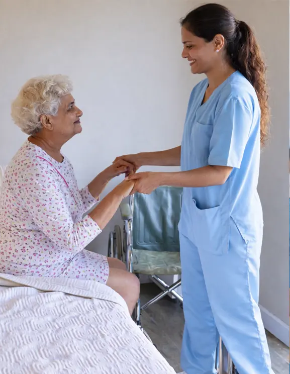 Rehabilitation nurse providing patient care at Punarvaas Hospital Bangalore